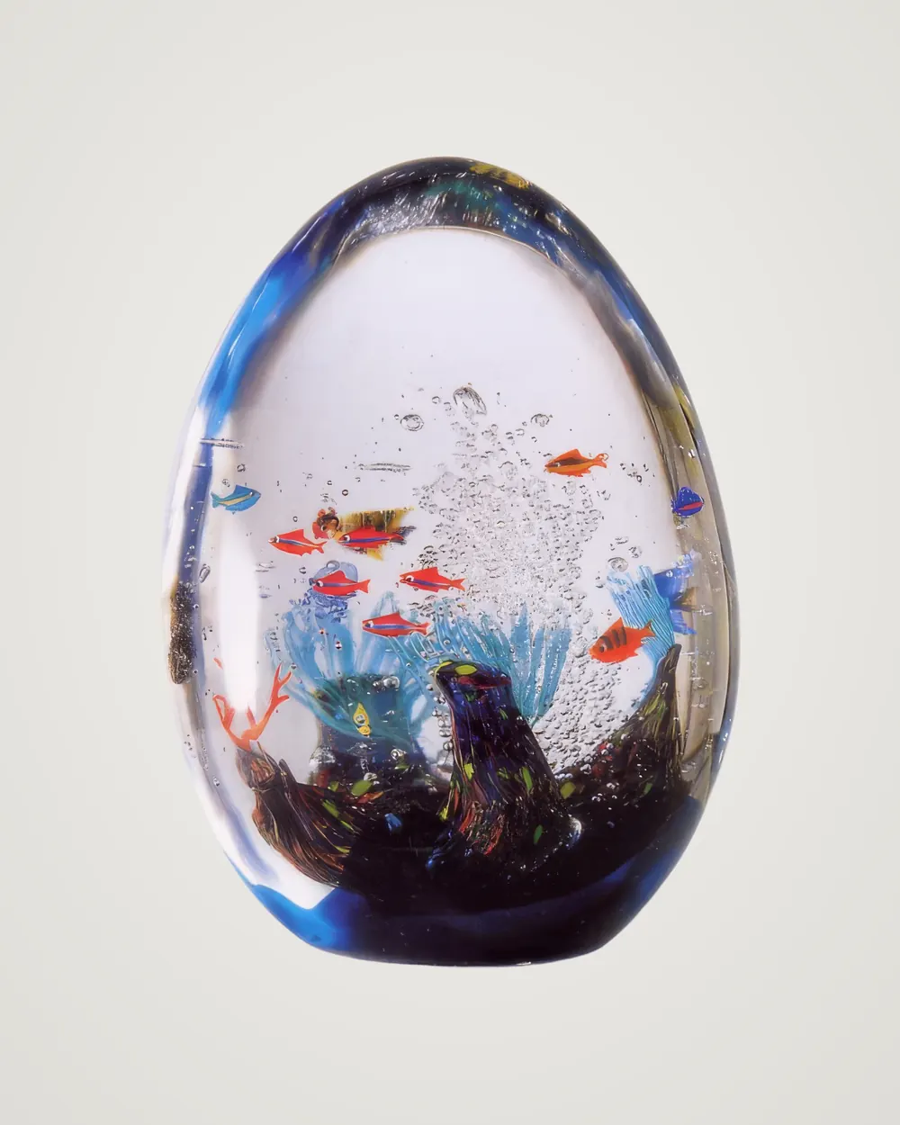 Egg-shaped Murano crystal aquarium with colourful fish