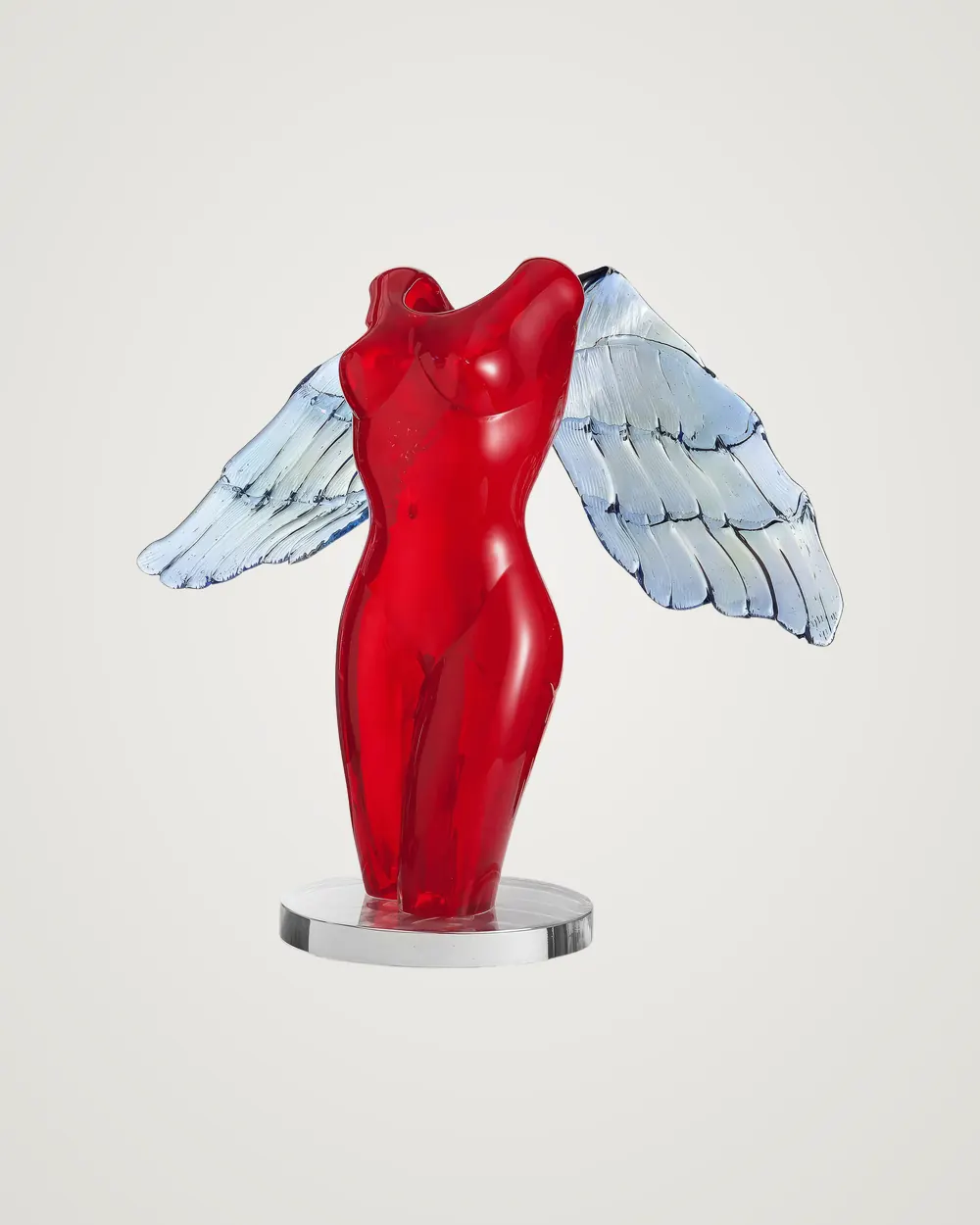 Glass sculpture by Alexis Silk: red torso with white wings